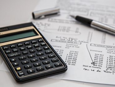 black-calculator-near-ballpoint-pen-on-white-printed-paper-53621 black-calculator-near-ballpoint-pen-on-white-printed-paper-53621